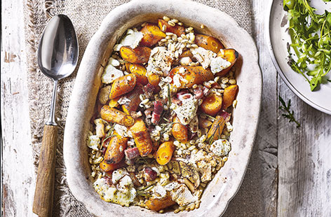 Embrace the colder evenings with this wonderfully warming pearl barley one-pot. Sweet carrots, bacon, hearty lentils and goat's cheese are baked until tender and drizzled with sharp balsamic vinegar for a midweek main that will really break the norm