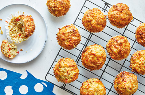 Make kids' lunchboxes more exciting with this easy veggie savoury muffins recipe, packed with red pepper, parsnip and spring onions
