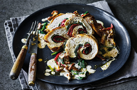 Enjoying restaurant-quality food doesn't have to mean going out. Cook up a chicken dinner with a difference using Tesco Finest corn-fed chicken, smoky roasted peppers and an indulgent wild mushroom and brandy sauce