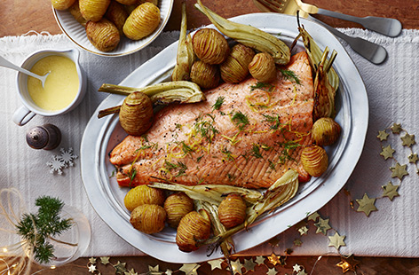 Try something new and impress your guests this Christmas with an alternative roast dinner starring delicate, zesty salmon