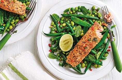 This simple salmon recipe is ready in just 30 mins! The salmon is coated in golden sesame seeds adding a delicious nutty crunch. Served with a fresh green veg medley tossed in a tangy lime dressing, this is the perfect light summer dinner.