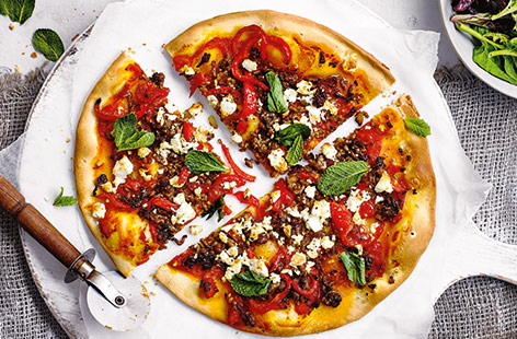Dreaming of a takeaway? Why not make your own with this speedy pizza recipe using pre-made pizza dough to save time