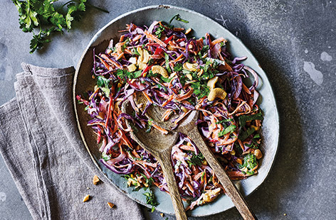 A fresh, colourful slaw is the perfect side to spicy curry, and this Indian-inspired version is a great twist on a classic coleslaw.
