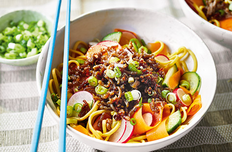 This super speedy noodle salad is ready in just 20 minutes. Crispy spiced pork combines with hot noodles and colourful crunchy veg for an easy midweek meal that's healthy and budget-friendly.