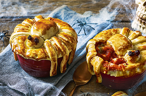 Kids and adults alike will be amazed by these scary vegetarian pies, stuffed with tomato, salad cheese, potatoes, and butter beans