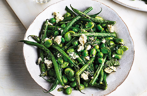 This speedy roast dinner side dish is bursting with fresh spring flavour – toss together green beans, broad beans and peas with fragrant dill and mint before crumbling over tangy feta