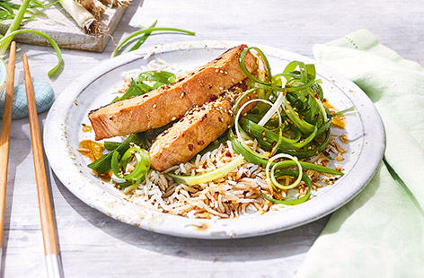 Try this fresh salmon salad for a simple grilled dinner. Salmon is marinaded in a sticky soy glaze that caramelises deliciously in the oven giving maximum sweet-and-salty flavour, plus shredded spring onions are tossed in a bold chilli and sesame dressing 