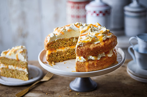 This pretty low sugar cake recipe is perfect for any celebration or special occasion, using Stevia to replace the sugar. The fruity sponges are sandwiched with creamy citrus icing and a drizzle of tangy orange curd for a treat everyone can enjoy.