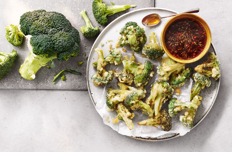 Try something different with this Japanese-inspired tempura broccoli recipe. The broccoli is fried in a light, golden batter (sparkling water is the secret ingredient to a super crisp batter) and served with a tangy dipping sauce for a vegetarian starter.