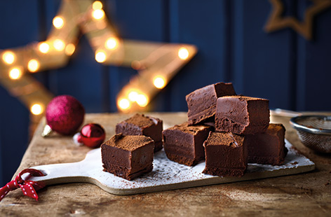 Make this creamy vegan chocolate fudge recipe for an elegant after-dinner nibble or sweet treat to share on the sofa this Christmas.