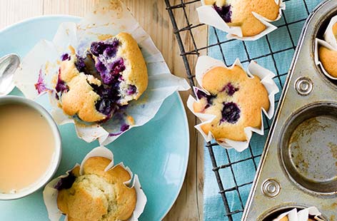 Wonderfully light and fluffy and bursting with tangy fruit, these blueberry muffins are great as a make-ahead breakfast, on-the-go snack or teatime treat. With just six ingredients this blueberry muffin recipe is so simple and budget-friendly – and is a great way of using up squishy berries. Find out how to make blueberry muffins and add this recipe to your baking collection.
