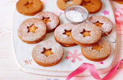 These gorgeous Christmas cookies take no time at all and are the perfect edible gift. The cut-out stars make great mini cookies which can be scattered over ice cream for a delicious pudding, too. They will keep for up to four days stored in an airtight container between layers of nonstick baking paper.