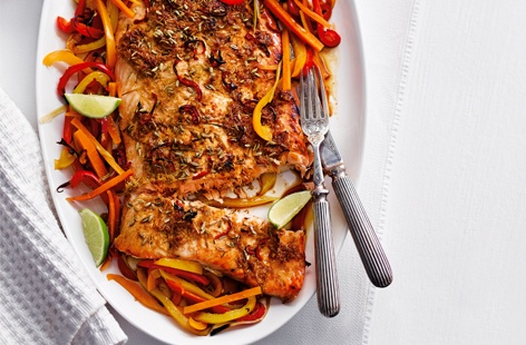 An alternative main for Christmas dinner or even for a festive get-together, your guests will be wowed by this vibrant fish centrepiece. Fragrant Asian spices and zingy, colourful vegetables complement salmon that is cooked to juicy, flaky, pink perfection