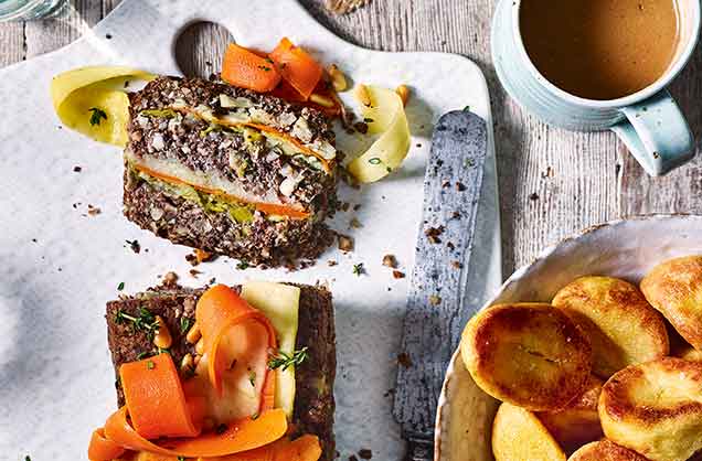 This vegan and gluten-free nut roast has stylish carrot and parsnip ribbons decoration to make this dish a pretty main course that everyone can enjoy. The hearty lentil base, along with plenty of nuts and veg, will keep you full all afternoon.