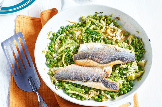 Buttery sea bass fillets with cider-braised greens recipe