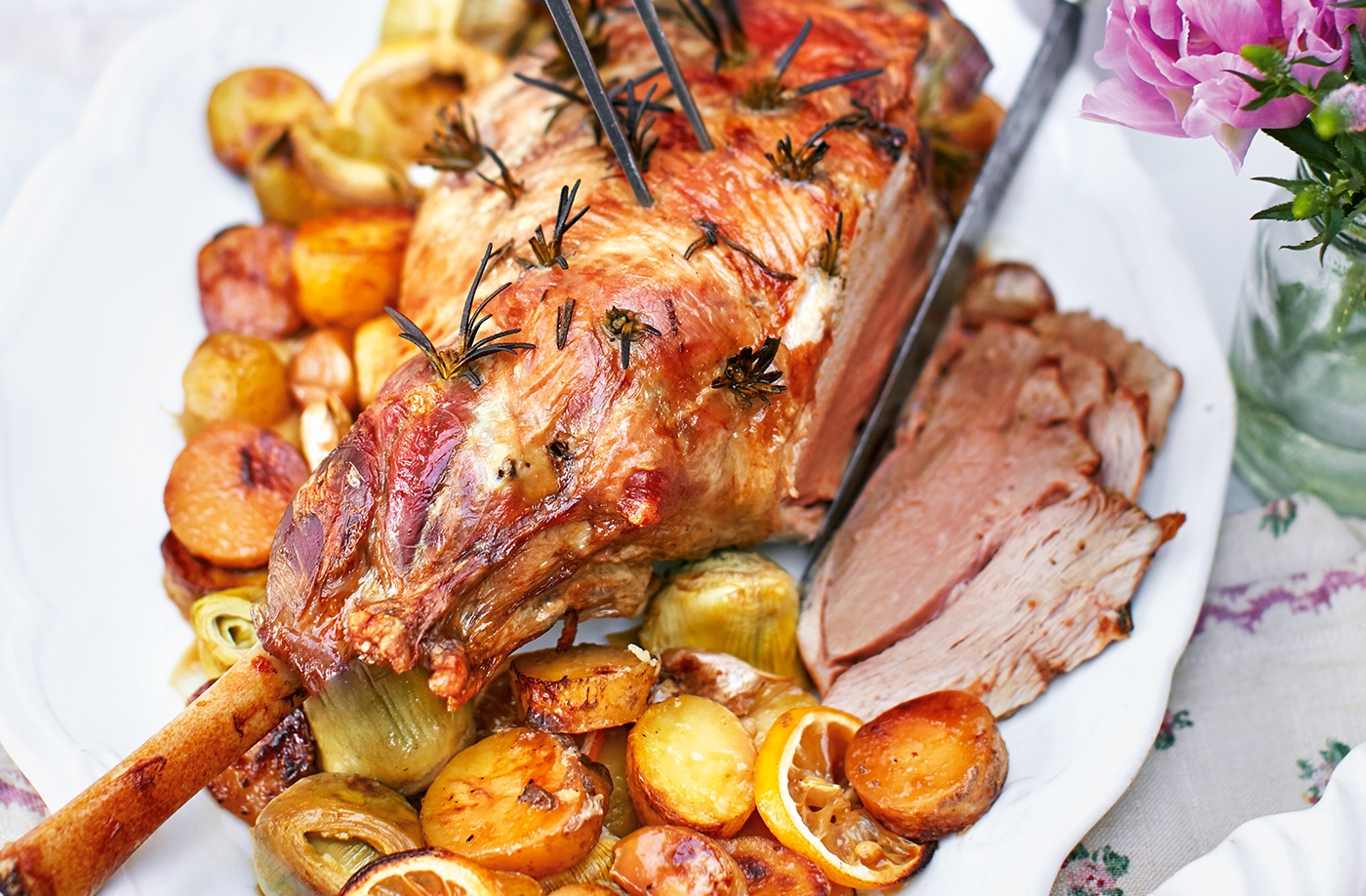 Roast lamb with artichokes, rosemary, lemon and potatoes recipe