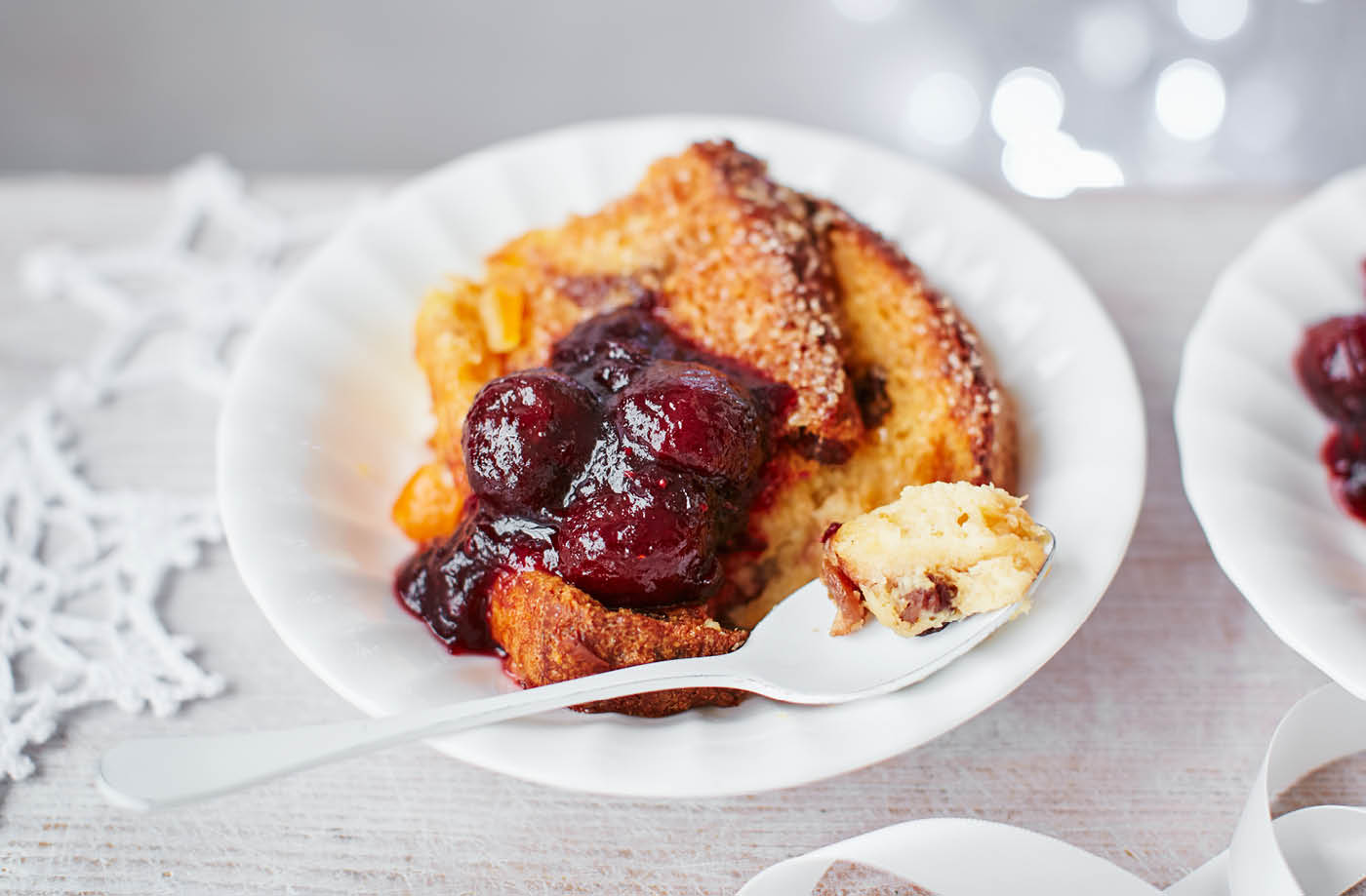 Baked panettone French toast with clementine, black cherry and cranberry sauce recipe