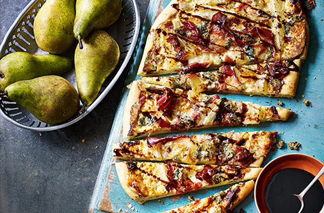 Using sweet pears as a pizza topping, alongside punchy Gorgonzola cheese, crème fraîche and a balsamic glaze, is a brilliant way to make the most of the season's juiceiest harvest