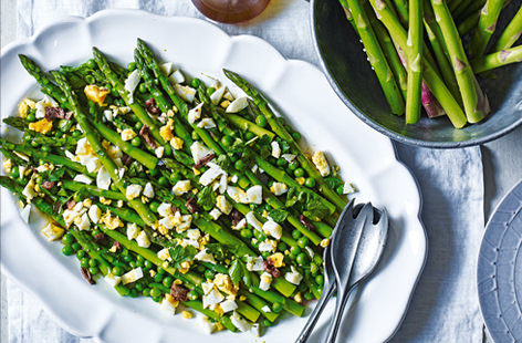 Make the most of this season's glorious asparagus with this delicious, healthy side dish. Finished with a punchy anchovy dressing, it is a perfect addition to any springtime spread.