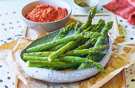 Charred on the outside but still crunchy to bite, griddled asparagus is one of life’s greatest culinary pleasures, especially when asparagus is in peak season. Serve with romesco sauce for a lovely addition to your Spanish fiesta spread