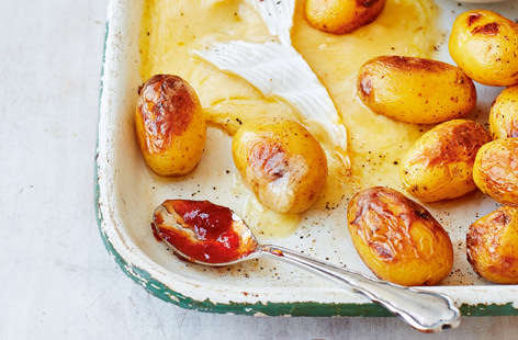 Nothing says summer like the first crop of Cornish potatoes and this dish really allows them to shine. Simply baked until crisp and golden, the potatoes taste heavenly served with melted Cornish brie, a plum chutney and pickle salad.