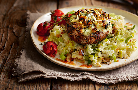 Gooey mozzarella and strong Stilton are stuffed into giant Portobello mushrooms for gloriously cheesy results. Served with a decadent creamy mash, this vegetarian dish is a real treat.