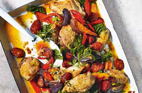 This Mediterranean-inspired chicken traybake is sure to become a new family favourite. Everything roasts in the oven for an easy hands-off meal with spicy chorizo, colourful veg and a touch of honey that becomes a wonderful sticky marinade for the chicken.