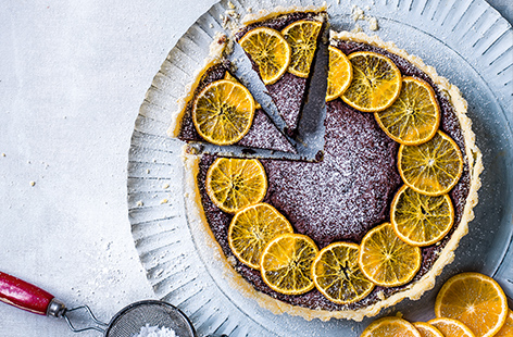 Serve up a stunning seasonal dessert this winter that everyone will love. This clementine and chestnut chocolate tart recipe is rich and indulgent and the perfect way to show off vibrant citrus flavours. 