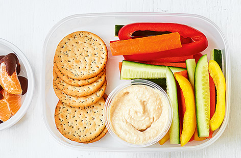 A healthy lunchbox idea for kids with crunchy crudités, crackers and dip as a quick and easy packed lunch. Find more Lunchbox recipes on Tesco Real Food.