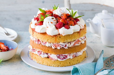 Inspired by a classic Eton mess, this elegant layered sponge cake is filled with all our favourite ingredients, from macerated strawberries and raspberries to whipped cream and crunchy meringue.