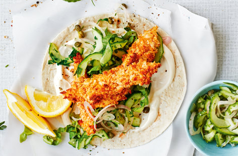 Have these tasty fish finger wraps on the table in just 25 minutes. With a light crumb and served with a chopped cucumber salad and a dollop of mayonnaise, these wraps make a light and delicious weeknight supper that will please kids and adults, alike. 