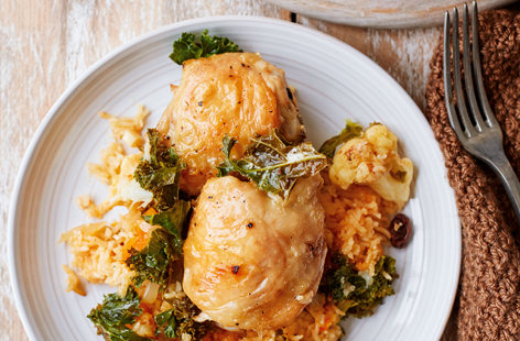 Let the oven do the work for a delicious dinner as tender chicken thighs, rice and plenty of veg cook slowly together in this hearty one-pot recipe. Given a fresh Moroccan twist with aromatic spices and juicy dried fruit, this is a perfect winter warmer.