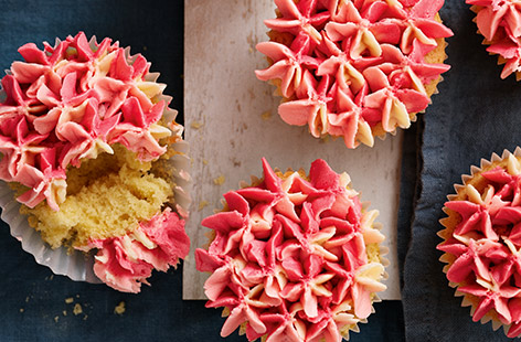 A simple spin on sweet buttercream icing turns a batch of easy vanilla cupcakes into pretty pink ombre petal cupcakes, perfect for birthday parties or an afternoon tea. The three tone pink icing adds an extra special touch that everybody will love.