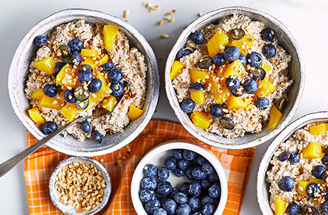 Preparing your oats the night before lets you start the day right with an easy morning. These creamy oats combine fresh fruit, crunchy hazelnuts and heat from chopped stem ginger for a super-quick tasty breakfast.