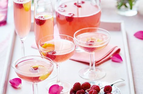 Starring sweetly-tart raspberries, fizzy pink lemonade and a zingy lemon peel garnish, this cocktail is perfect for enjoying with friends