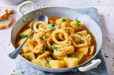 Smoked paprika adds a wonderful depth to this rich Spanish stew. Whipped up in just 30 minutes and filled with potato cubes and tender squid rings, this makes a great weeknight recipe. 