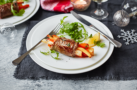 Try this delicious meaty starter for your next dinner party or festive feast. Quick-cooked minute steaks are wrapped around a roasted vegetable filling to create gorgeous little parcels your guests will love. Serve with a simple salad garnish for an easy, 