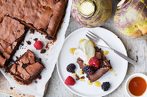 Gooey and sweet, these cardamom-spiced brownies make a delicious pudding. Swede, a root veg which is actually a turnip-cabbage hybrid has a sweet, earthy flavour that works in this dessert. Serve with a dollop of crème fraiche and fresh berriess