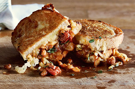 Take a cheese toastie up a notch with a combination of mozzarella as well as Cheddar, plus an added layer of homemade Boston beans for the ultimate indulgent treat.