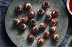 Fancy chomping on a gruesome eyeball this Halloween? Made from mini beef meatballs, these horrifying eyes make a great savoury Halloween snack.