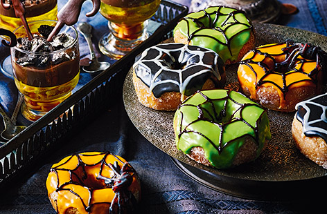 Make your Halloween party extra terrifying with these spooked-up spiderweb doughnuts. With just a little icing and lots of creepy colouring, you can transform simple doughnuts into the ultimate Halloween party treat