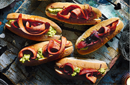 Not your average hot dog, these terrifying tongue rolls have been given a Halloween makeover with 'bloody' ketchup-covered sausages and avocado slime. 