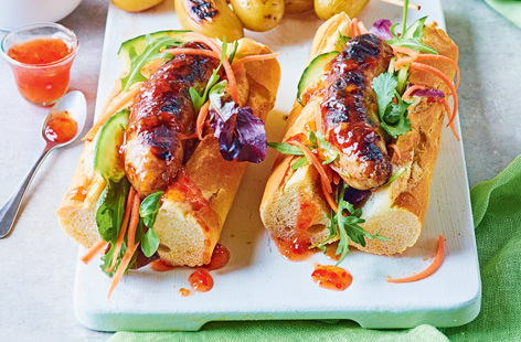Not your average hot dog, this Vietnamese-inspired banh mi version is sure to be the talk of your barbecue. Fresh white baguettes are filled with juicy sausages, crunchy spiralized carrot and topped with a dollop of sweet chilli dressing.