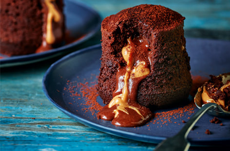 Bite into the soft spongey chocolatey shell of this decadent dessert and watch the volcano of melted chocolate and peanut butter flow deliciously from its centre. 