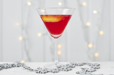 This pretty, pink martini is sure to make your party guests blush! Made with lemon and cranberry juice, maple syrup, vodka and Angostura bitters, this punchy martini is sure to get the party started.