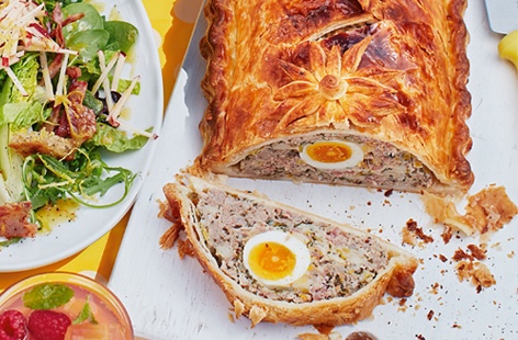 The ultimate picnic bake – sausage, onion and leek pie with perfecly soft-boiled eggs baked right in and a golden pastry crust
