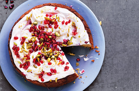Bejewelled with pomegranate seeds and pistachios, this stunning bake is made with yogurt for a lighter finish and subtly flavoured with vanilla and orange.