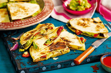 With soft aubergine, melted cheese and creamy guacamole oozing out of each tortilla triangle, every mouth-watering bite of these quesadillas will make you unable to resist reaching for another one