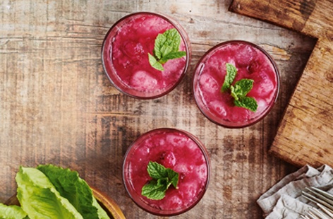 Made with fragrant mint, raspberries and an optional glug of rum, muddled together with lime and sugar, these vibrant rojitos – think raspberry inspired mojitos – are the perfect al fresco refresher