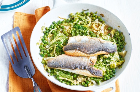 This light summer recipe is a delicious dinner for two, with crispy-skinned sea bass nestled into a soft bed of greens and a velvety cider butter. You can easily replace the seabass with any fish you have in the fridge. It’s delicious with haddock or bream